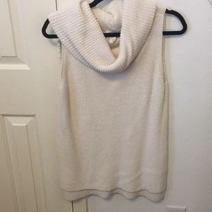 Sleeveless turtleneck cream top